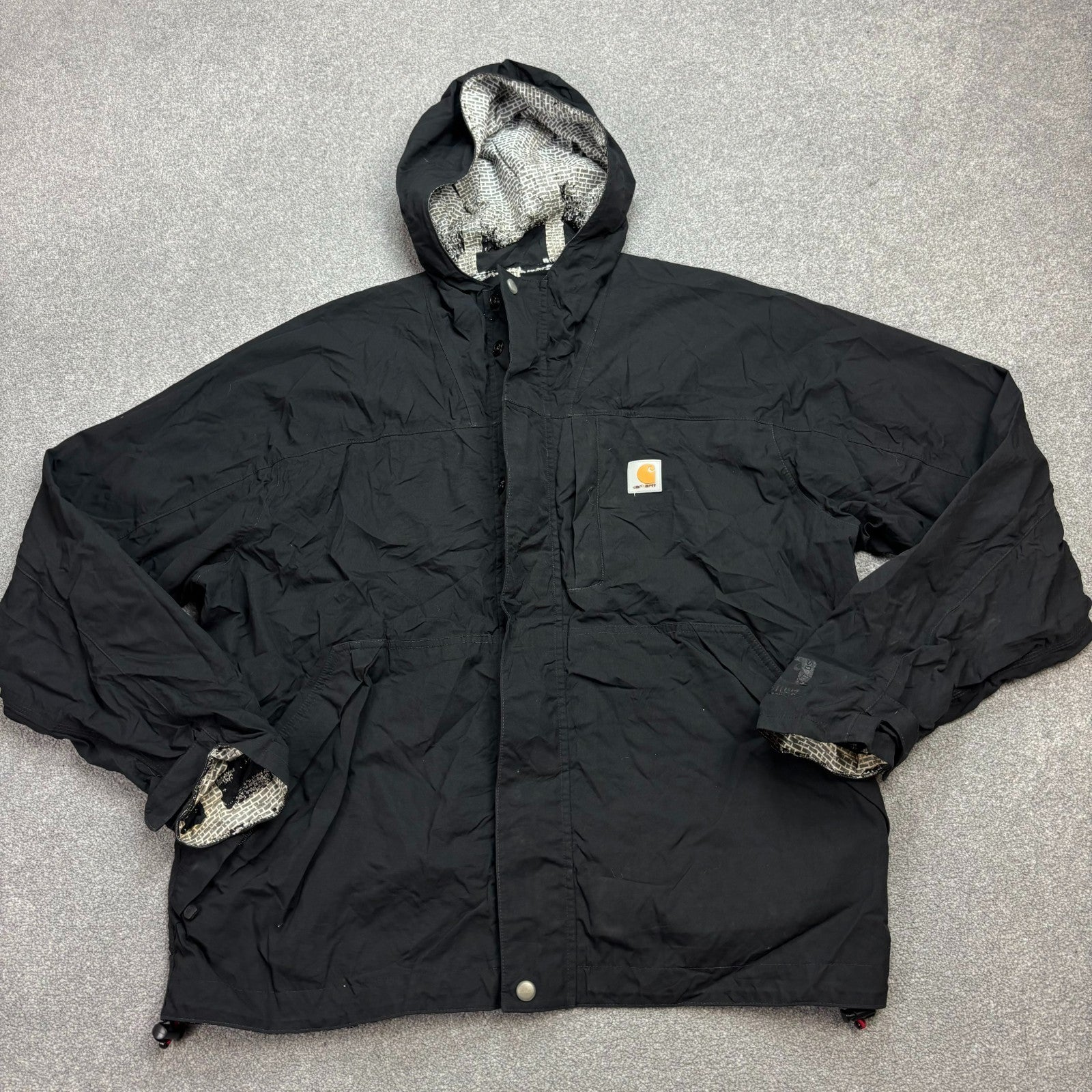 Carhartt Men’s Storm Defender Hooded Rain Jacket – Black | Lined Work Coat (Size L)