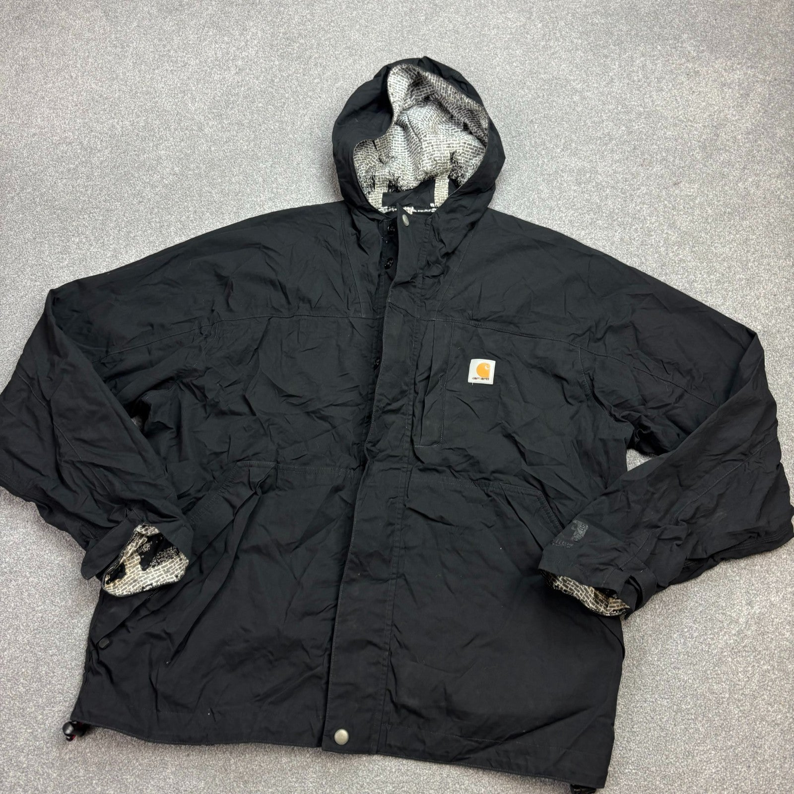 Carhartt Men’s Storm Defender Hooded Rain Jacket – Black | Lined Work Coat (Size L)